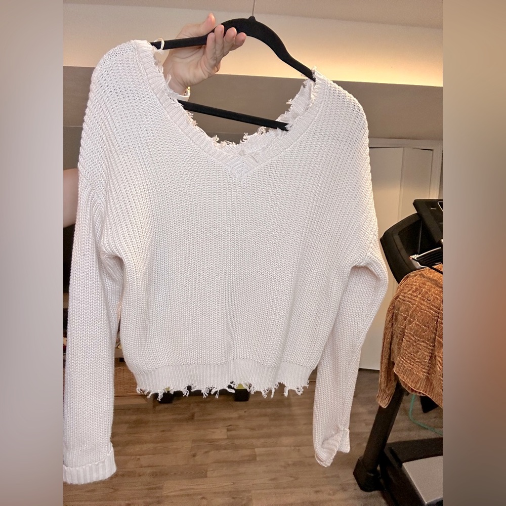 Cropped distressed sweater